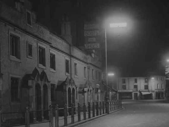 New street lighting illuminating Rugby town centre in the late 1940s.