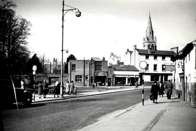 Church Street in 1953, captured on camera by Rodney Huntingford from Redding's Photographic Studio.