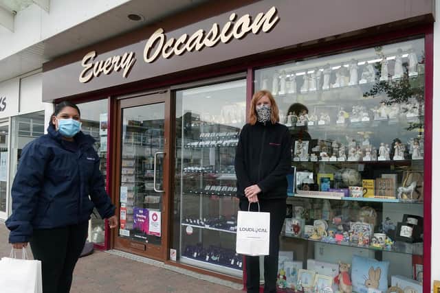 Priya Pandit of LoudLocal hands out a goodie bag at Every Occasion in Kenilworth.