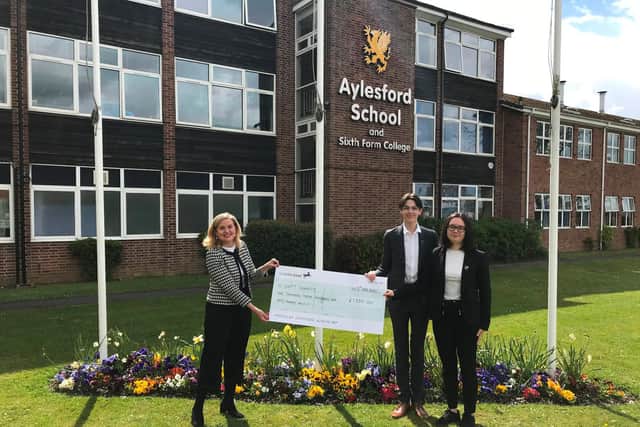 Eileen Rock, fundraising manager at the South Warwickshire NHS Foundation Trust with Head Girl Lauren Maher and Head Boy Luke Weatherby-Blythe. Photo supplied