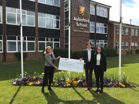 Eileen Rock, fundraising manager at the South Warwickshire NHS Foundation Trust with Head Girl Lauren Maher and Head Boy Luke Weatherby-Blythe. Photo supplied