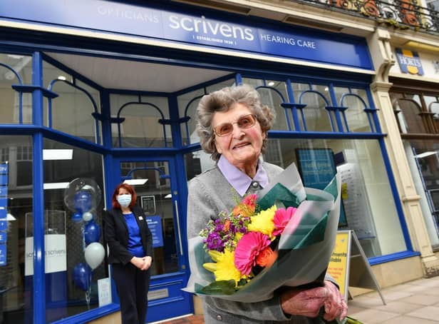 Customer Pat Stokes at Scrivens Opticians & Hearing Care, Rugby, with manager Sarah Cave in background.