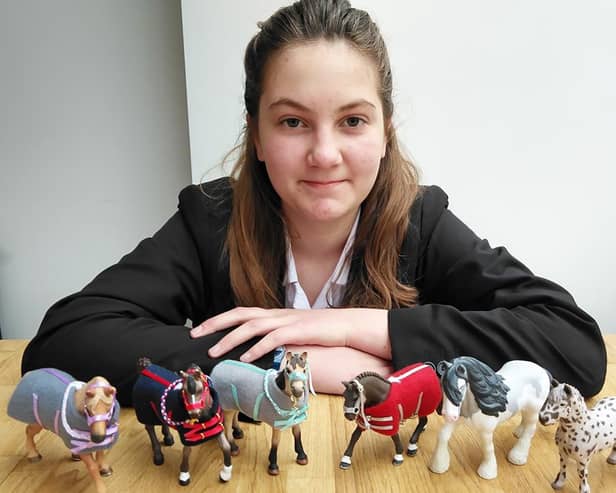 Hannah with items for her shop. Photo supplied