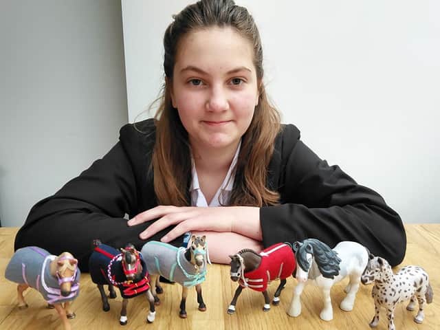 Hannah with items for her shop. Photo supplied