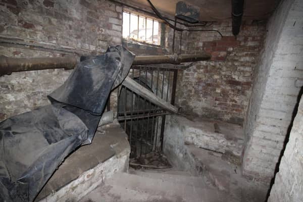 last week, Ian Panter went to investigate the tunnel entrance in the basement of The Parade office when he used to work. Photo by Ian Panter.