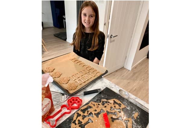 Lilly Garratt has been using her baking and craft skills to help raise money for two charities; Dog Bus and the Guide Dogs.