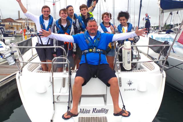 A Warwick-based volunteer on a sailing trip with young people. Photo supplied