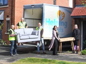 From the left, Jim Palmer, James Sinnott, Andy Brown and Tracey Littlejohns from the Helping Hands Community Project with Stephanie Green from AC Lloyd Homes. Photo supplied