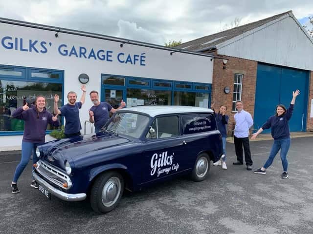The staff from Kineton's Gilks' Garage Cafe stand around their new delivery van known as 'Cobby' who is now ready for action