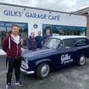 The Gilks' Garage Cafe staff and Cameron Mair from C.M. Signs stand around the cafe's new delivery van affectionately known as 'Cobby' - officially a 1961 Commer Cob.