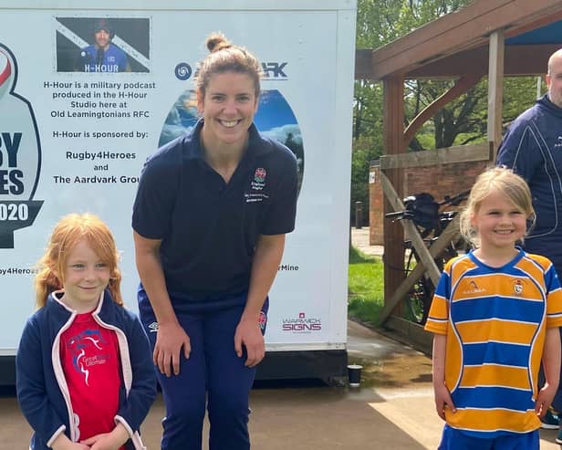 England Ladies Rugby Captain, Sarah Hunter, with junior players Evie and Chloe at Old Leamingtonians RFC.