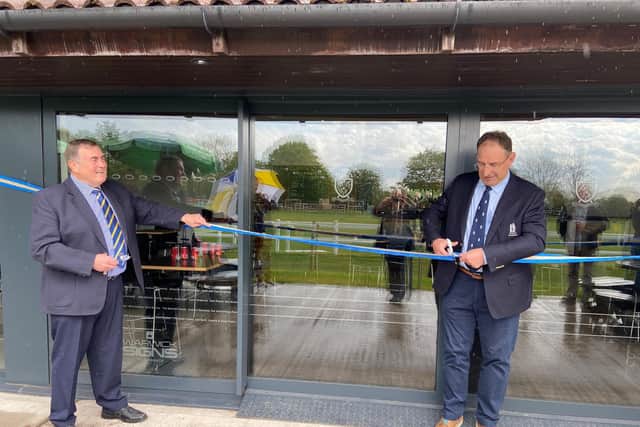 OLS Club President Mike Hemming with Warwickshire RFU President, Matt Smith performing the ribbon cutting for the newly refurbished club house at the rugby club.