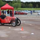 Reporter Alex drives the Austin 7, complete with very patient instructor. Photo courtesy of Max Willson of www.maxfilms.co.uk