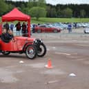 Reporter Alex drives the Austin 7, complete with very patient instructor. Photo courtesy of Max Willson of www.maxfilms.co.uk