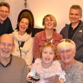 Tony and Joyce Guy with their family.