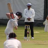 George Scrimshaw bowling against Oswestry  (Picture by Steve Johnson)