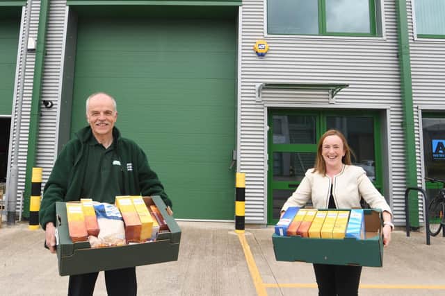 David Witham, chair of trustees at Warwick District Foodbank, (left) with Kylie Cooper, Senior Associate in Commercial Real Estate at Wright Hassall, outside Warwick District Foodbank’s new premises at Trident Business Centre.