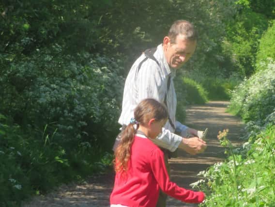 Richard Allanach and his granddaughter explore the Northampton Lane by-way. This area has been declared as having a low-habitat value by Rugby Borough Council.