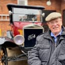 John Farringdon with a classic Ford car.