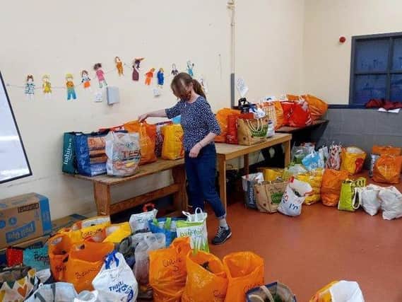 Sydni Centre volunteer Romy doing the veg bags at the Sydni Centre. Photo supplied