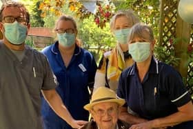 Pictured with Walter are Allan Fairweather (home manager) Pauline and Sarah (care staff) and Jacinda who is a close friend to Walter.