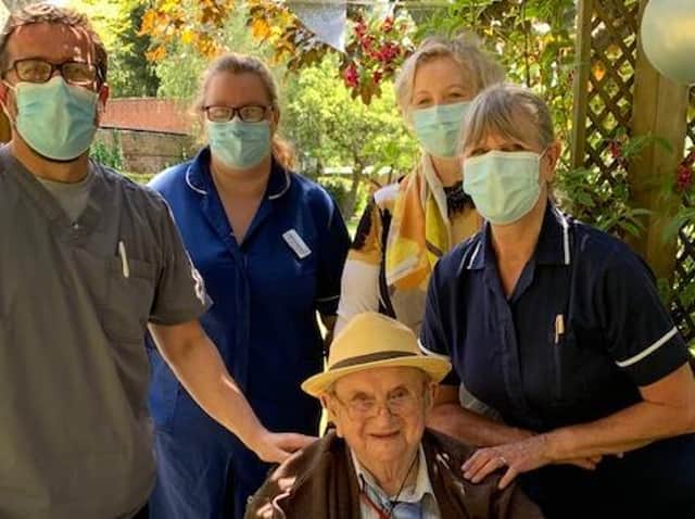 Pictured with Walter are Allan Fairweather (home manager) Pauline and Sarah (care staff) and Jacinda who is a close friend to Walter.