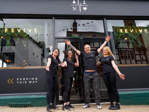 Lee Mallen and his team welcome customers to Revive Café and Bar. Photo by Loz Moore Photography.