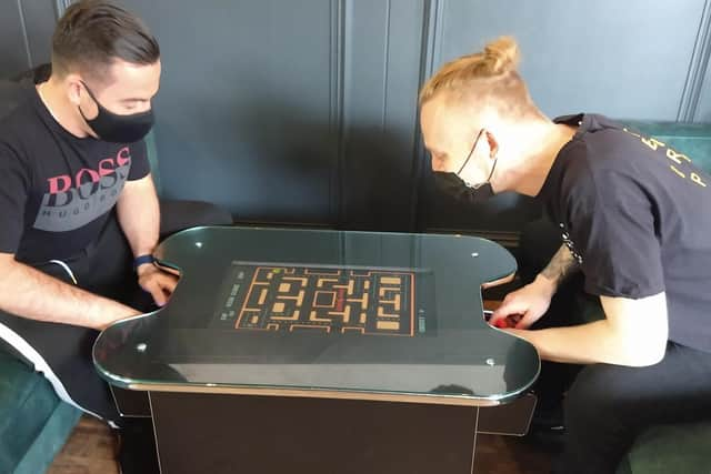 One of the gaming tables. Photo by Loz Moore Photography.