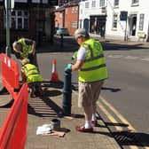 Six Rotarians at Lutterworth Rotary Club got behind the council to paint the eight bollards that stand nearby the memorial.
