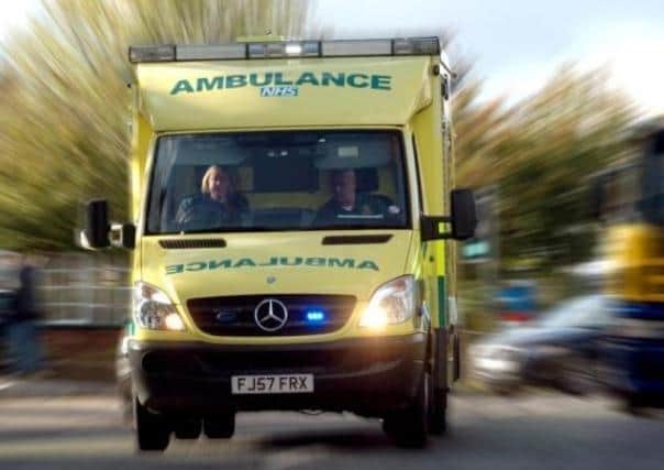 A paramedic was punched in the face as he tried to help an injured woman in Southam.
