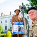 Robin Hood with the statue at the Leamington War Memorial
