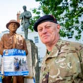 Robin Hood with the statue at the Leamington War Memorial