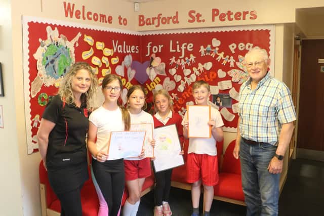(Left to Right) Mrs Carson, Bethan Williams, Anna Heath-Kime, Isla Cullen and Harvey Evans from Barford St Peter’s with portfolio holder for climate change Alan Rhead. Photo supplied