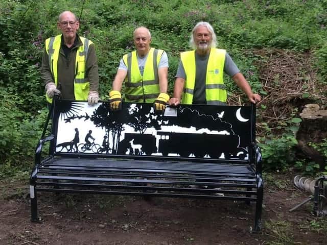 L-R Volunteers David Sims, Andy Wright and Bob Holloway with one of the new benches.