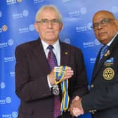 David Brain hands the chain of office to his successor President Paul Jaspal. Photo supplied