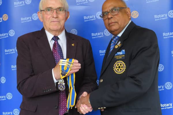 David Brain hands the chain of office to his successor President Paul Jaspal. Photo supplied
