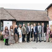 The Feldon Dunsmore team outside the doors of their new offices. Photo supplied