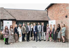 The Feldon Dunsmore team outside the doors of their new offices. Photo supplied