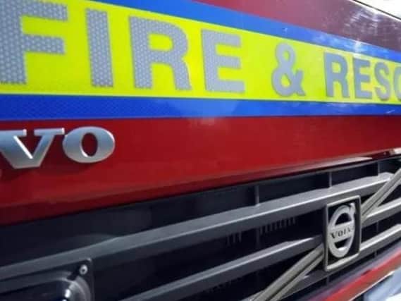 Firefighters are dealing with a fire at Asda's petrol station in Sydenham.