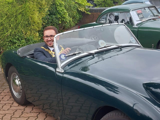 The Mayor of Warwick, Cllr Richard Edgington, inside a Healey car.