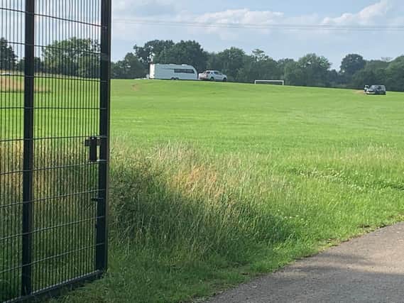 Travelers have set up a large encampment on the grounds of Central Ajax FC in Warwick "putting the future of the club in jeopardy".