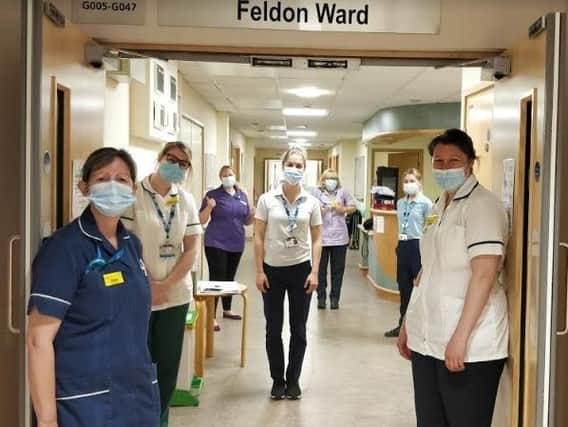Maria (centre) with her Feldon Ward Colleagues including ward manager Chris Powell (front left).
