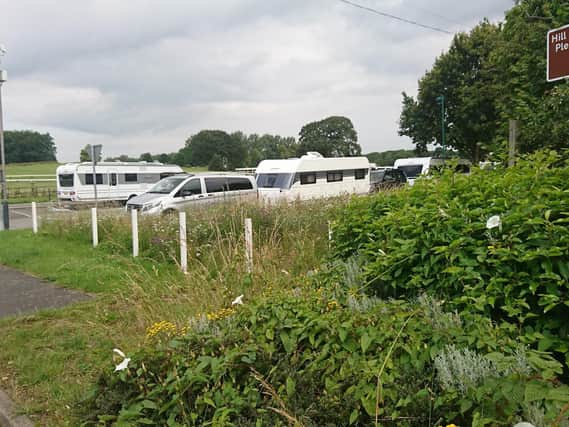 Travellers have set up camp in a car park by Warwick Racecourse.