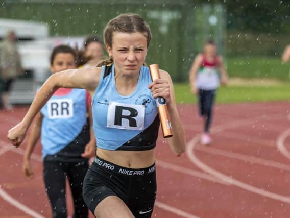 ISABELLE KNIGHT storming to victory in the U13 girls 4 x 100m relay