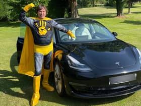 Kwalee CEO David Darling dressed as a 'Hypercasual Hero' to launch the games company's challenge in which indie developers can win substantial investment and a Tesla Model 3 electric car (pictured).
