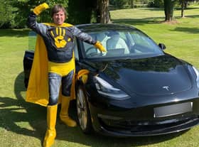 Kwalee CEO David Darling dressed as a 'Hypercasual Hero' to launch the games company's challenge in which indie developers can win substantial investment and a Tesla Model 3 electric car (pictured).