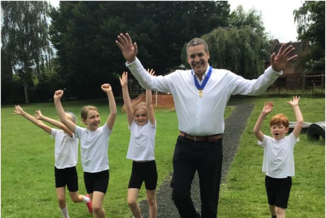 Honiley Class (Year 2) at The Ferncumbe C of E Primary School took part in sponsored walk to raise money for Plastic Oceans UK and were joined by Cllr Terry Morris for the final part of their challenge. Photo supplied.
