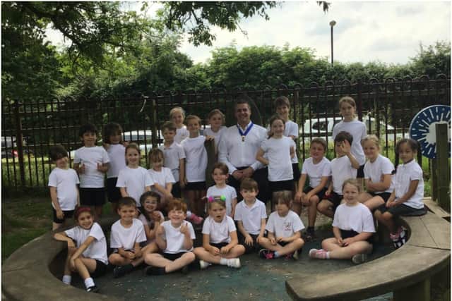 Honiley Class (Year 2) at The Ferncumbe C of E Primary School took part in sponsored walk to raise money for Plastic Oceans UK and were joined by Cllr Terry Morris for the final part of their challenge. Photo supplied.