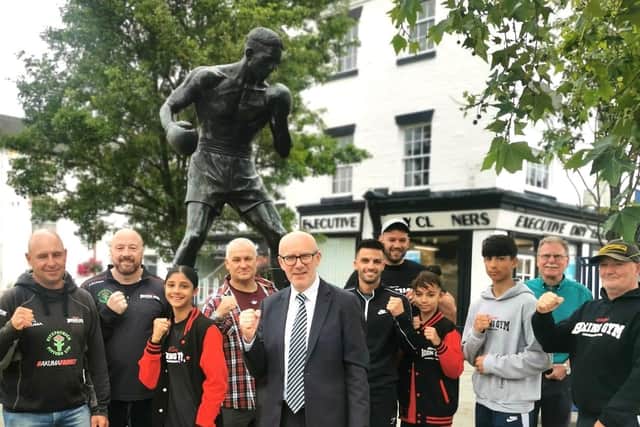 MP Matt Western in Warwick town centre by the statue of Randy Turpin with members of local boxing clubs. Photo supplied