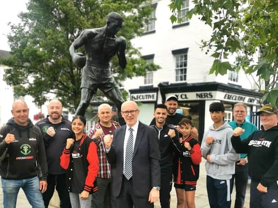 MP Matt Western in Warwick town centre by the statue of Randy Turpin with members of local boxing clubs. Photo supplied